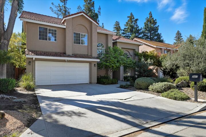 Property Photo:  387 E Braddock Drive  CA 93720