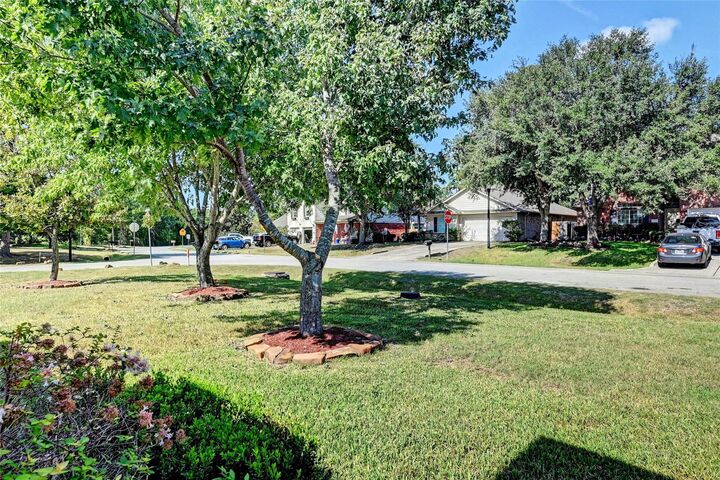 Property Photo: 9227 Hidden Lake E TX 77354