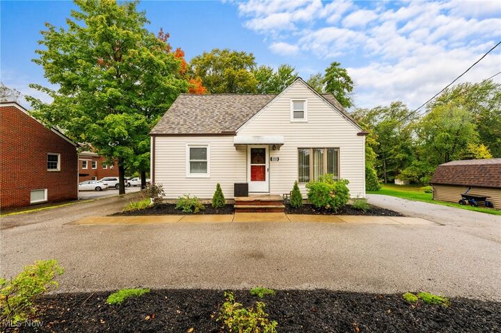 Property Photo:  6950 Hopkins Road  OH 44060 