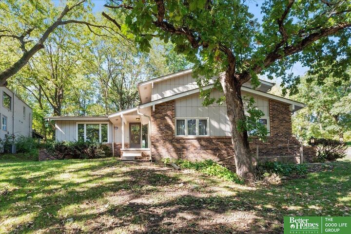 Property Photo: 9242 Raven Oaks Drive NE 68152
