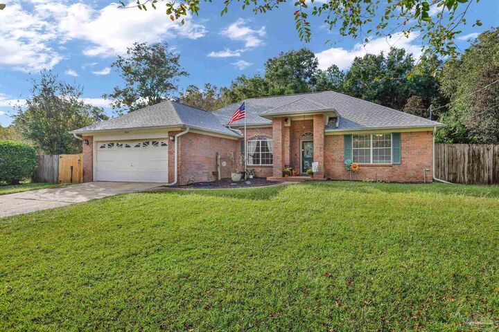 Property Photo:  5615 Whispering Woods Dr  FL 32571