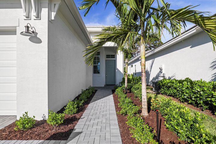 Property Photo:  220 SE Via Sangro  FL 34953