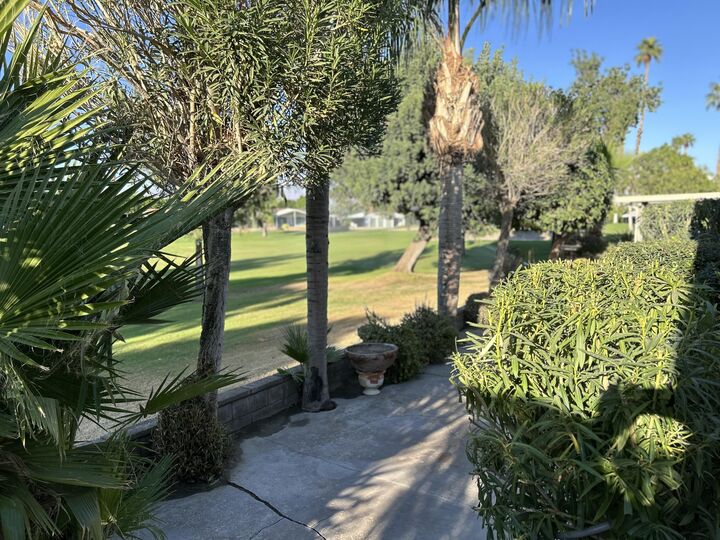 Property Photo: 73450 Country Club Drive 208 CA 92260