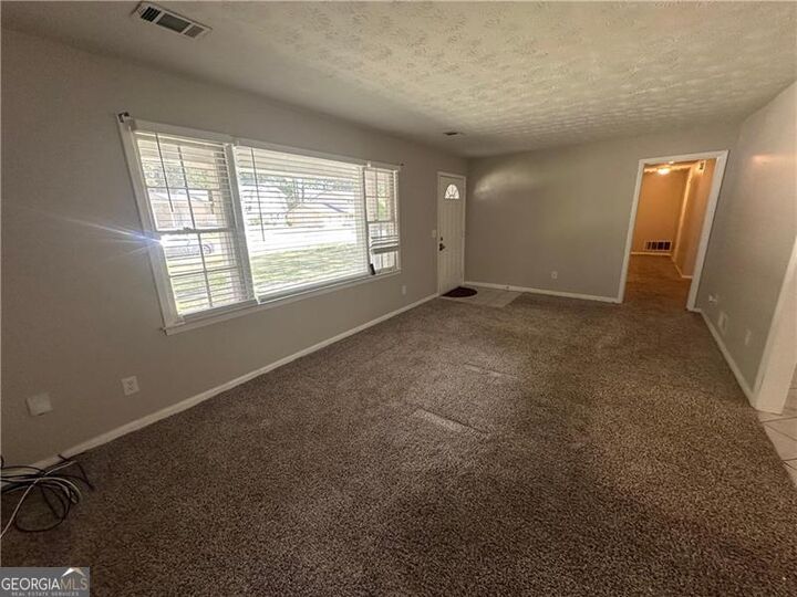 Property Photo:  727 S Carter Drive  GA 30236 