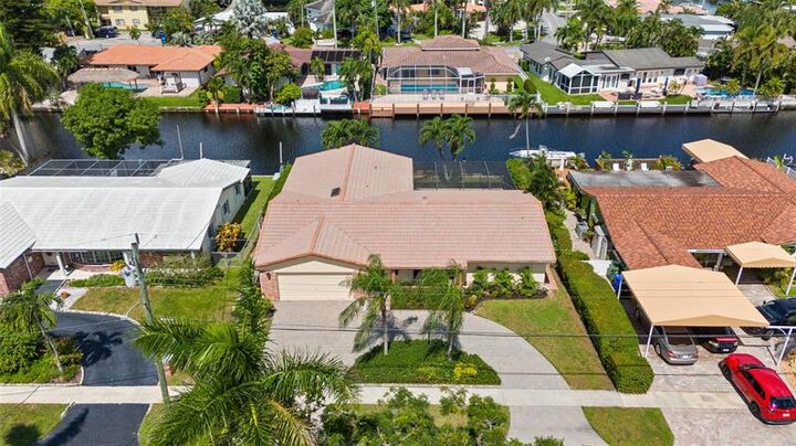 Property Photo: 1419 NE 57th Pl FL 33334