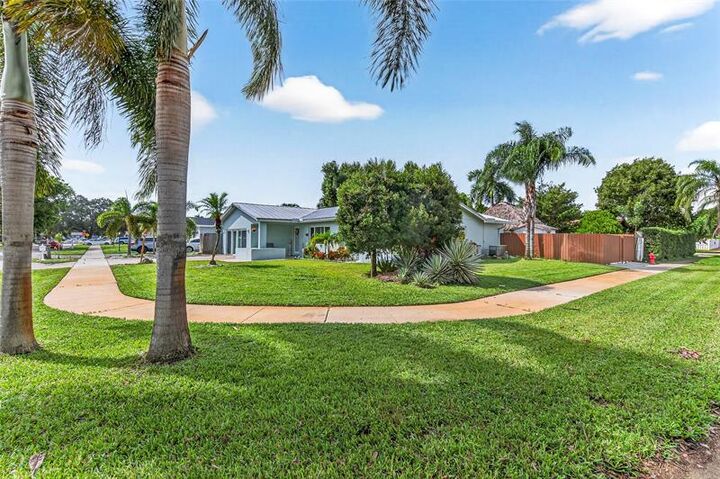 Property Photo:  6847 NW 27th Way  FL 33309 