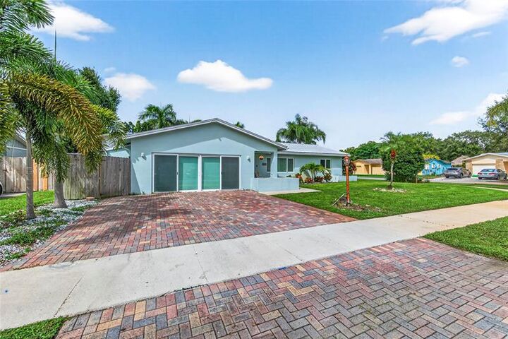 Property Photo: 6847 NW 27th Way FL 33309