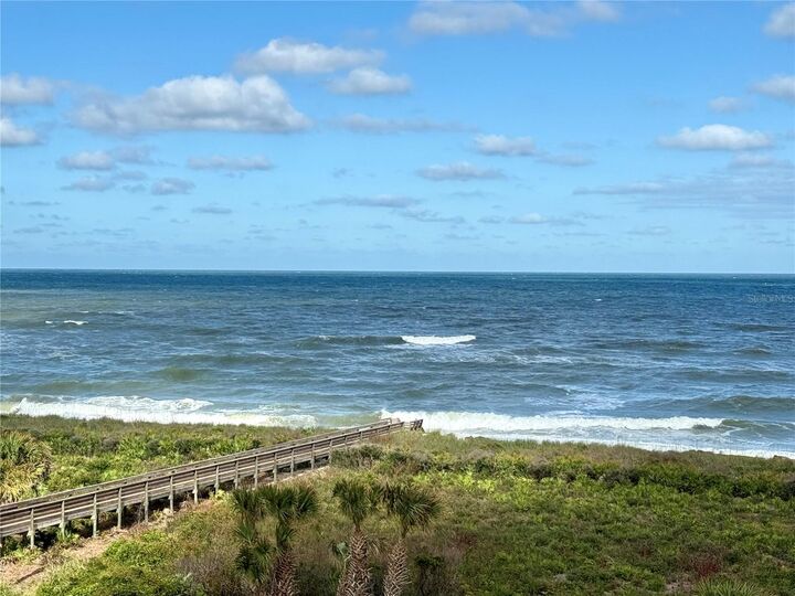 Property Photo: 104 Surfview Drive 1504 FL 32137
