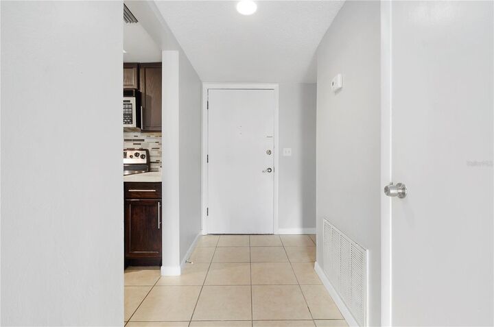 Property Photo:  5957 Windhover Drive C03  FL 32819 