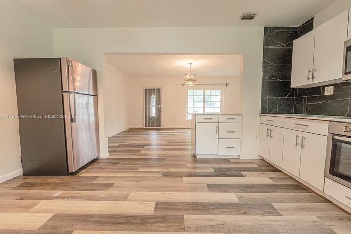 Property Photo:  12426 NW 8th Ave A  FL 33168 