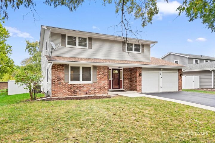 Property Photo:  1408 Swallow Street  IL 60565 