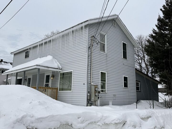 Property Photo:  111 4th Avenue  ME 04756