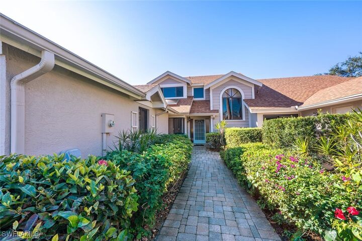 Property Photo: 20 Water Oaks Way 3-10 FL 34105