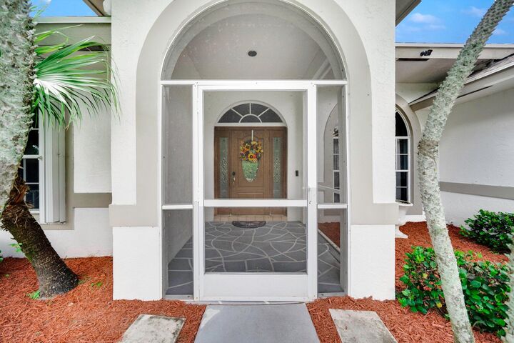 Property Photo:  13935 Geranium Place  FL 33414 