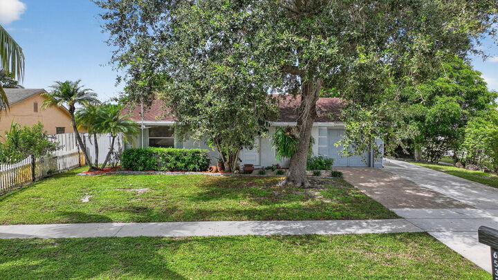 Property Photo: 6533 Athena Drive FL 33463
