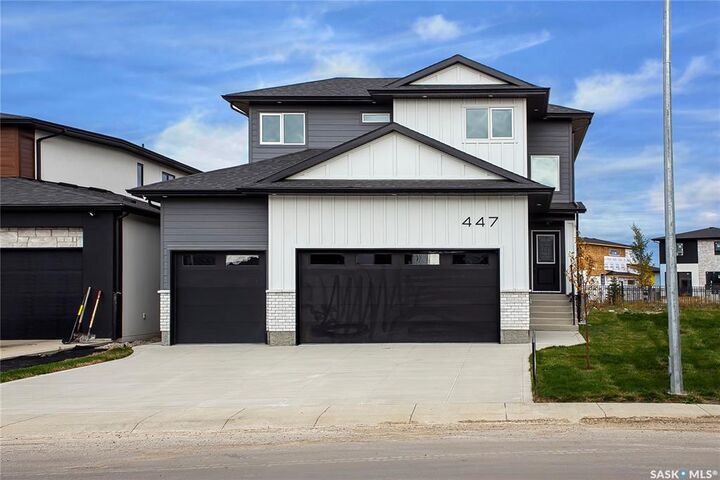 Property Photo: 447 Woolf Bend SK S7W 1E4