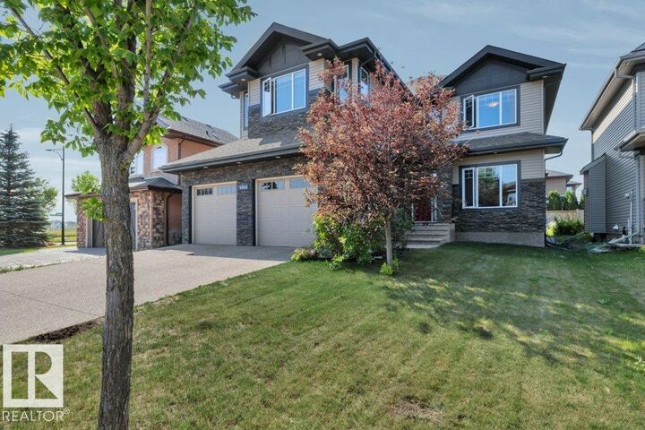 Property Photo: 1211 Adamson Drive SW AB T6W 0V5