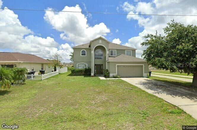 Property Photo: 157 Conch Drive FL 34759