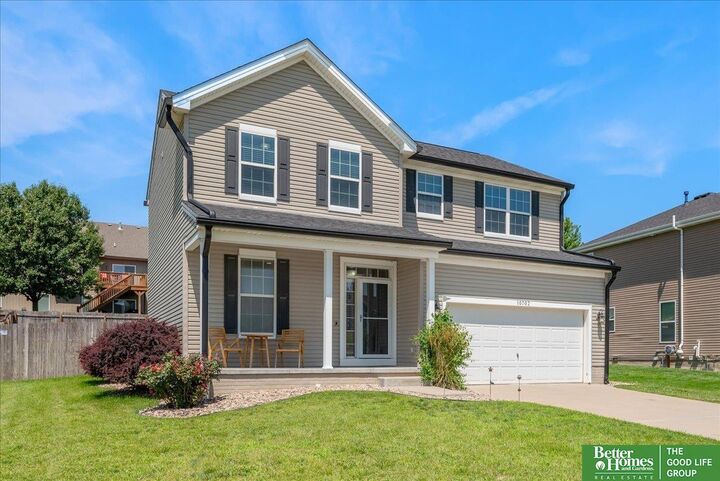 Property Photo: 10702 S 110 Avenue NE 68046