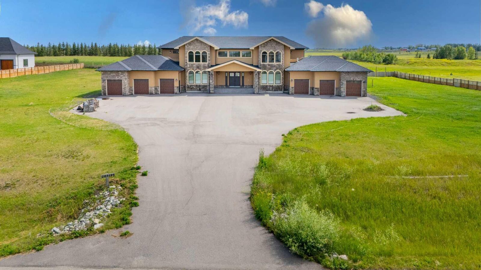 Property Photo:  283185 Serenity Place  AB T1Z 0L7 