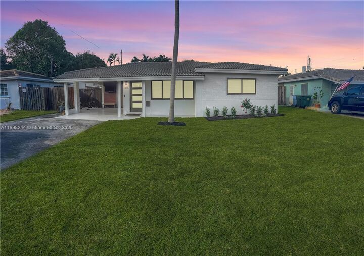 Property Photo:  351 NE 43rd St  FL 33334 