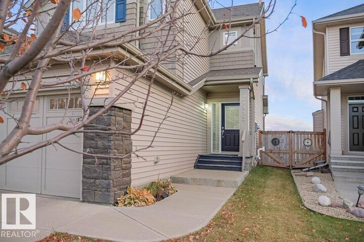 Property Photo:  7913 Erasmus Crescent NW  AB T6M 0S3 