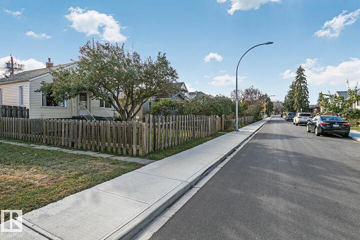 Property Photo:  9221 110 Avenue NW  AB T5H 1H2