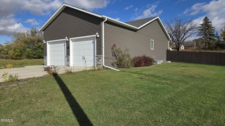 Property Photo:  1209 Evenson Drive  ND 58054 