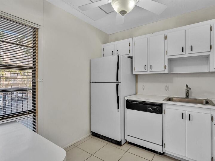 Property Photo:  20500 W Country Club Dr 203  FL 33180