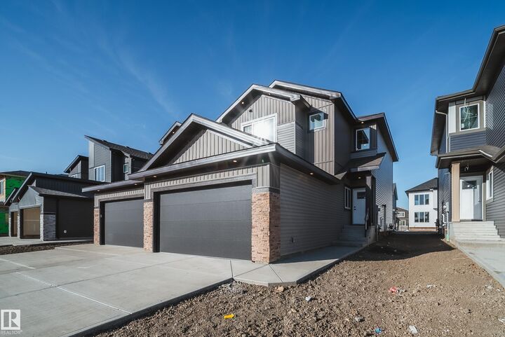 Property Photo:  18 Blackbird Bend  AB T8L 0G6 