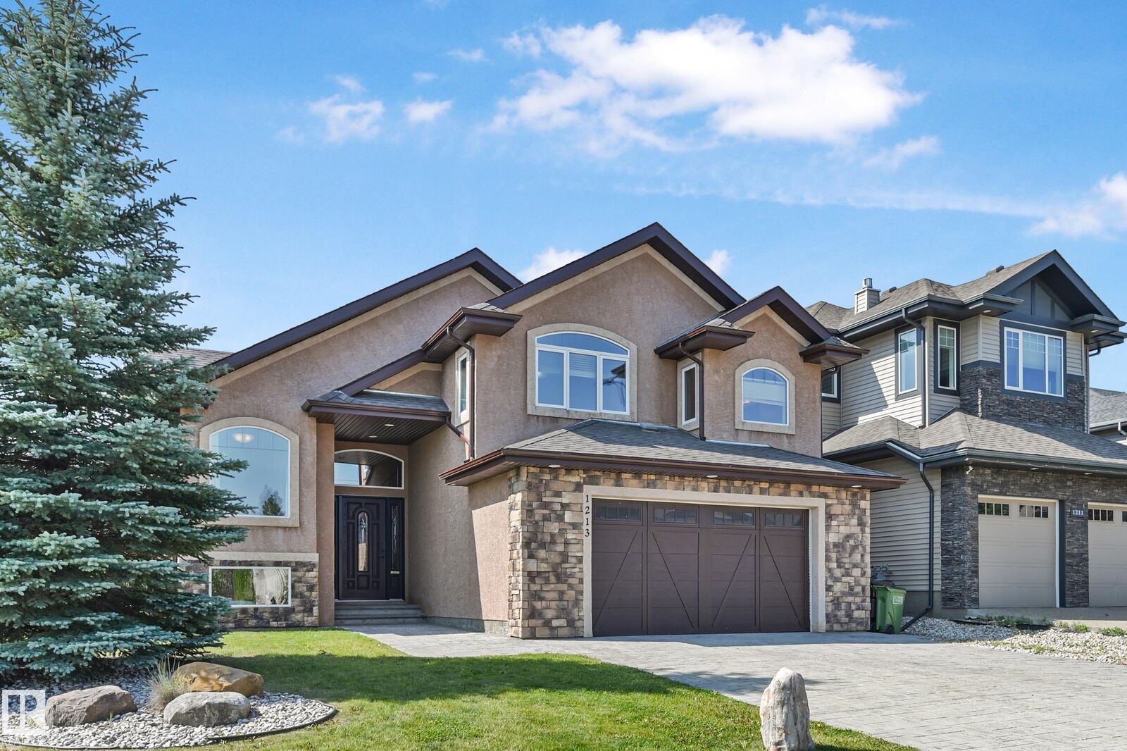 Property Photo: 1213 Adamson Drive SW AB T6W 0V5