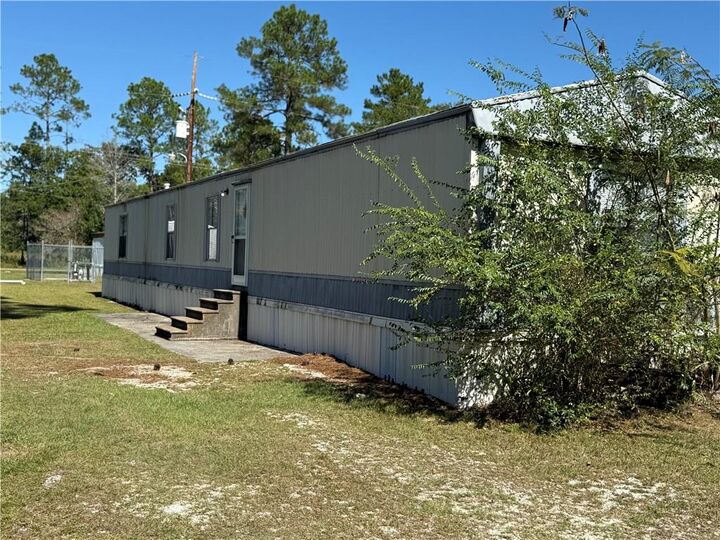Property Photo:  64096 Mangano Road 136  LA 70452