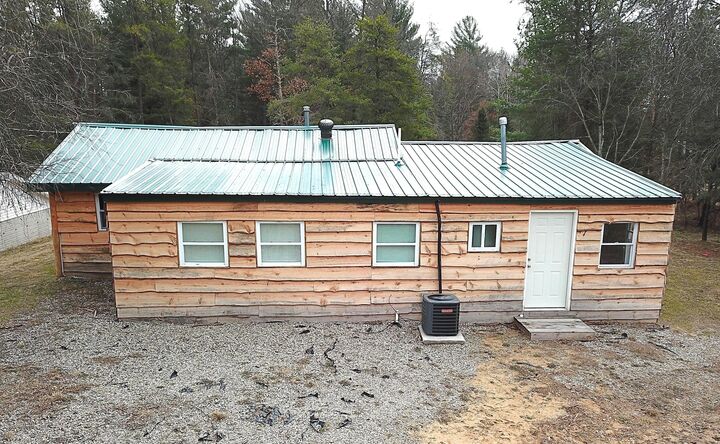 Property Photo:  9871 Manitowac  MI 48656 