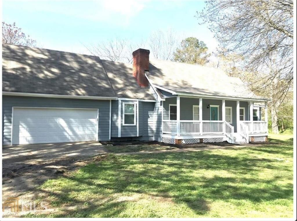 Property Photo: 6744 Rockbridge Road GA 30087