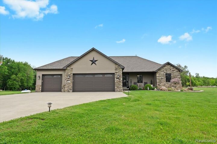 Property Photo:  6035 Beard Road  MI 48418 9757