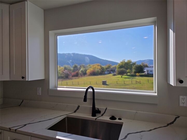 Property Photo:  819 9th Avenue W  MT 59901 