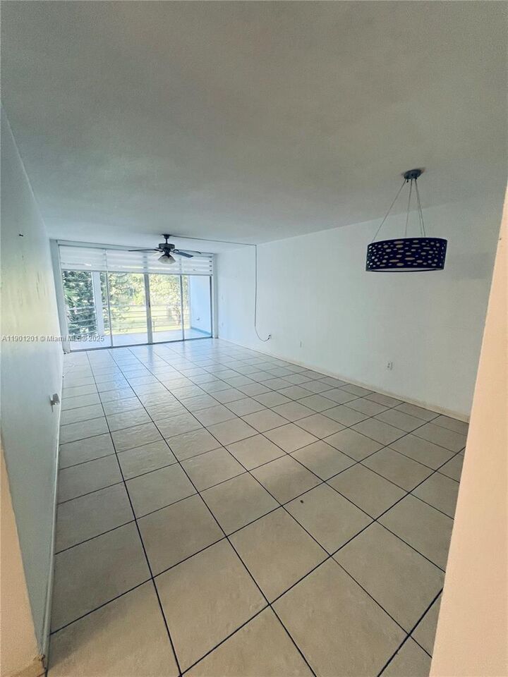 Property Photo:  1351 NE 191st St E211  FL 33179