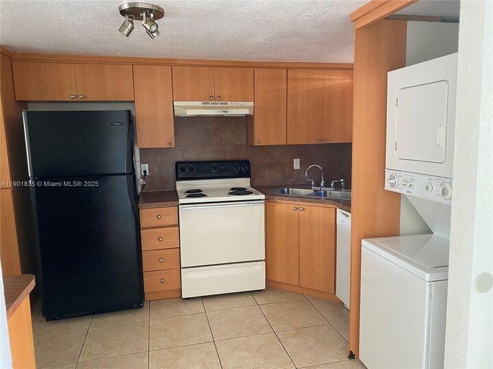 Property Photo:  3750 NW 115th Ave 7-5  FL 33065