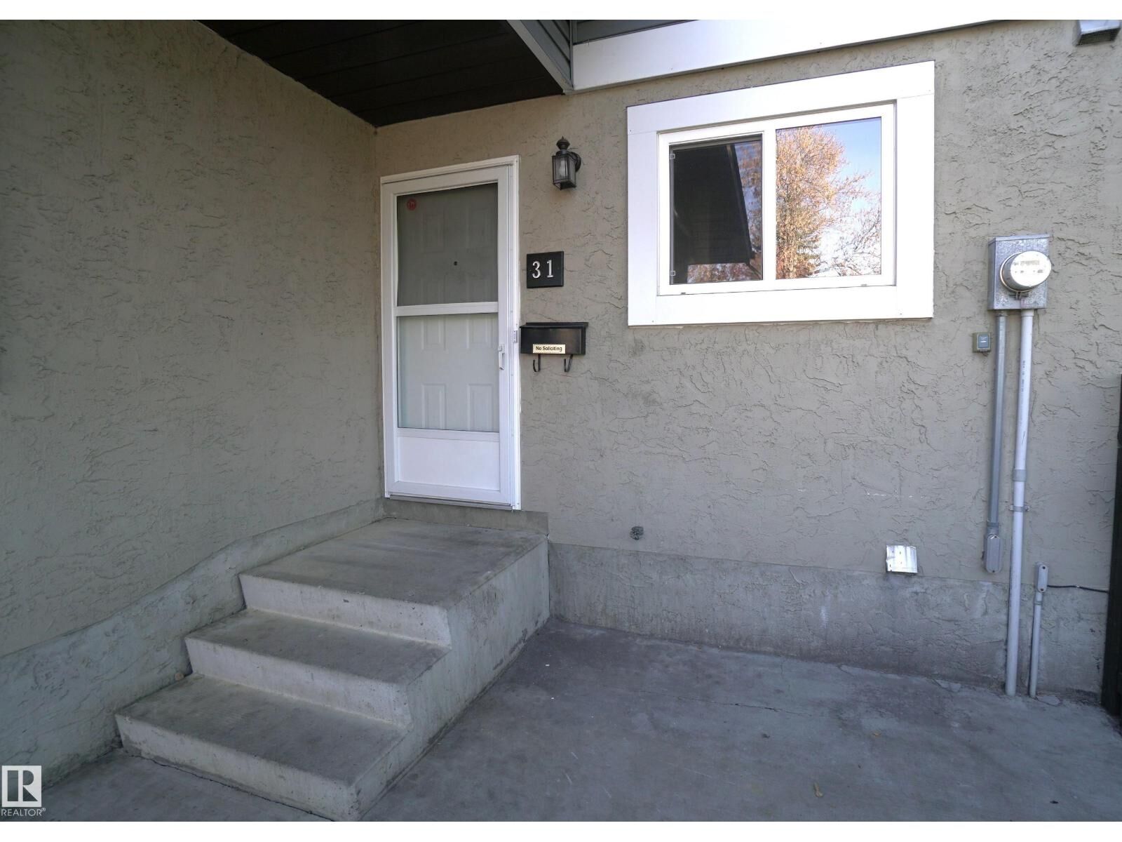 Property Photo:  #31 7604 29 Av NW  AB T6K 3Z2