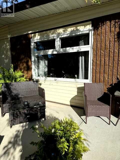 Property Photo:  204 9 Avenue Southeast  AB T0J 0Y6