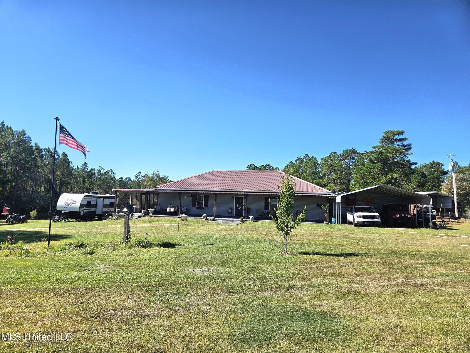 Property Photo: 27588 E Lake Cypress Drive MS 39573