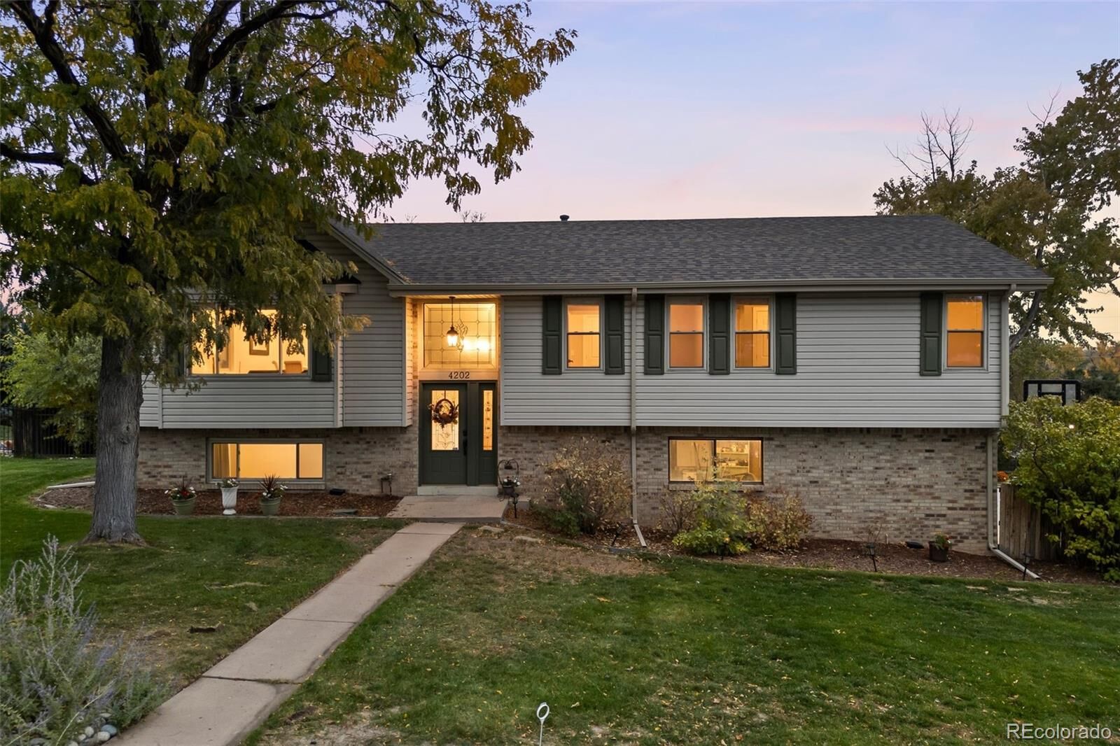 Property Photo: 4202 W Pondview Place CO 80123