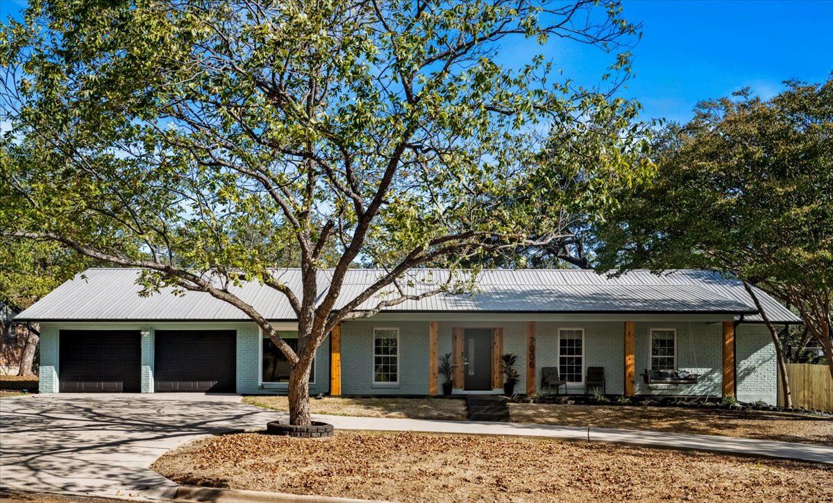 Property Photo: 7006 Whispering Creek Drive TX 78736