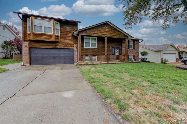 Property Photo:  128 Universal Drive  MO 63376