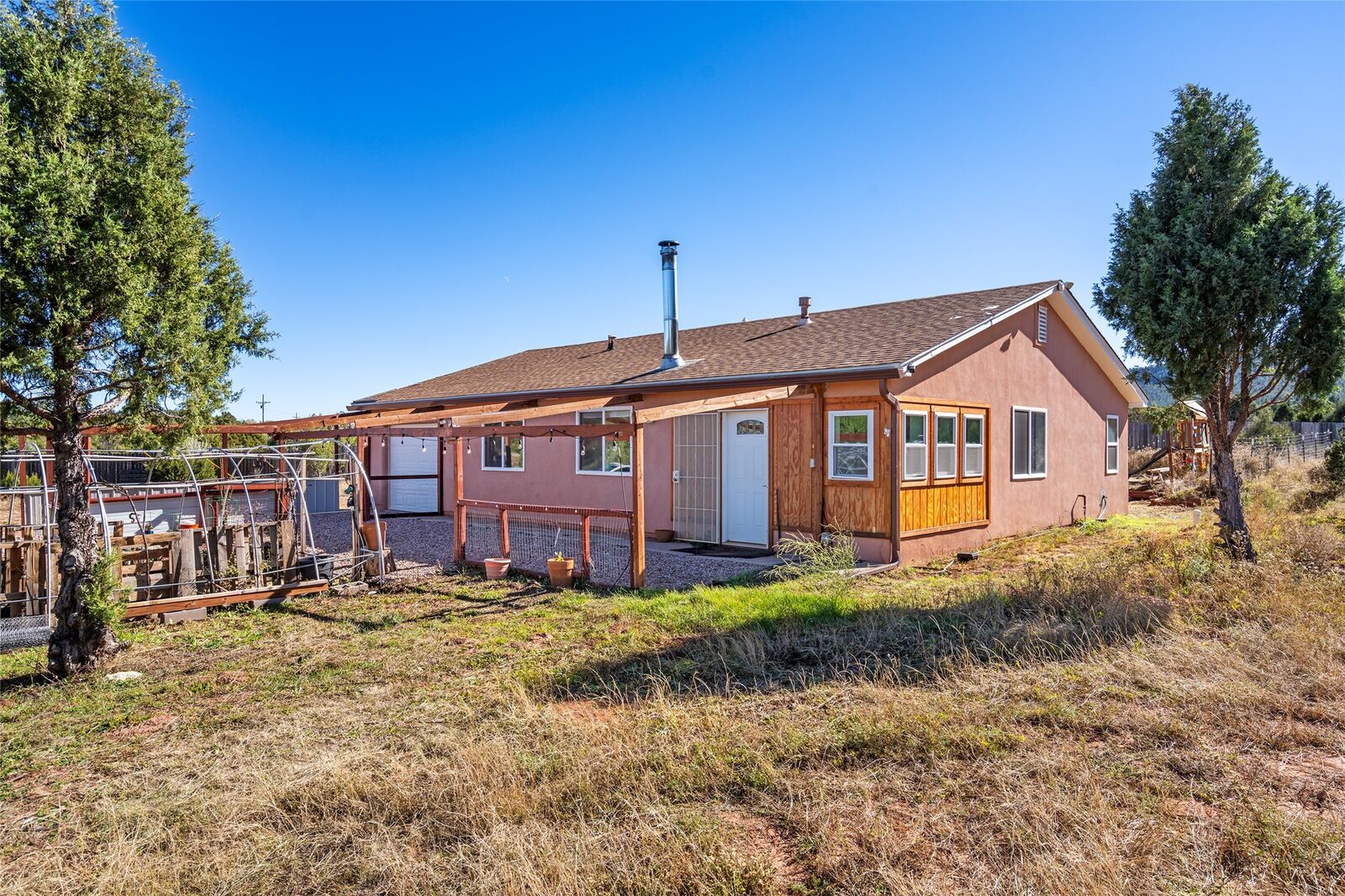 Property Photo: 166 Frontage Rd 2116 NM 87562