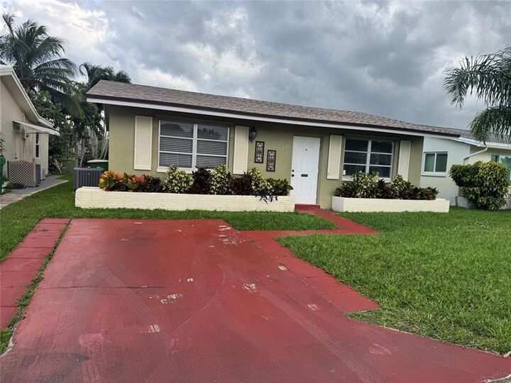 Property Photo:  4938 NW 54th Ct  FL 33319 