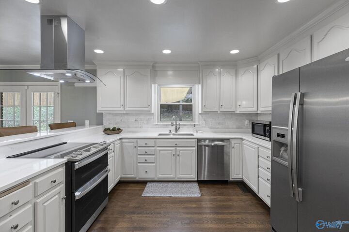 Property Photo:  1209 Kennamer Drive SE  AL 35801