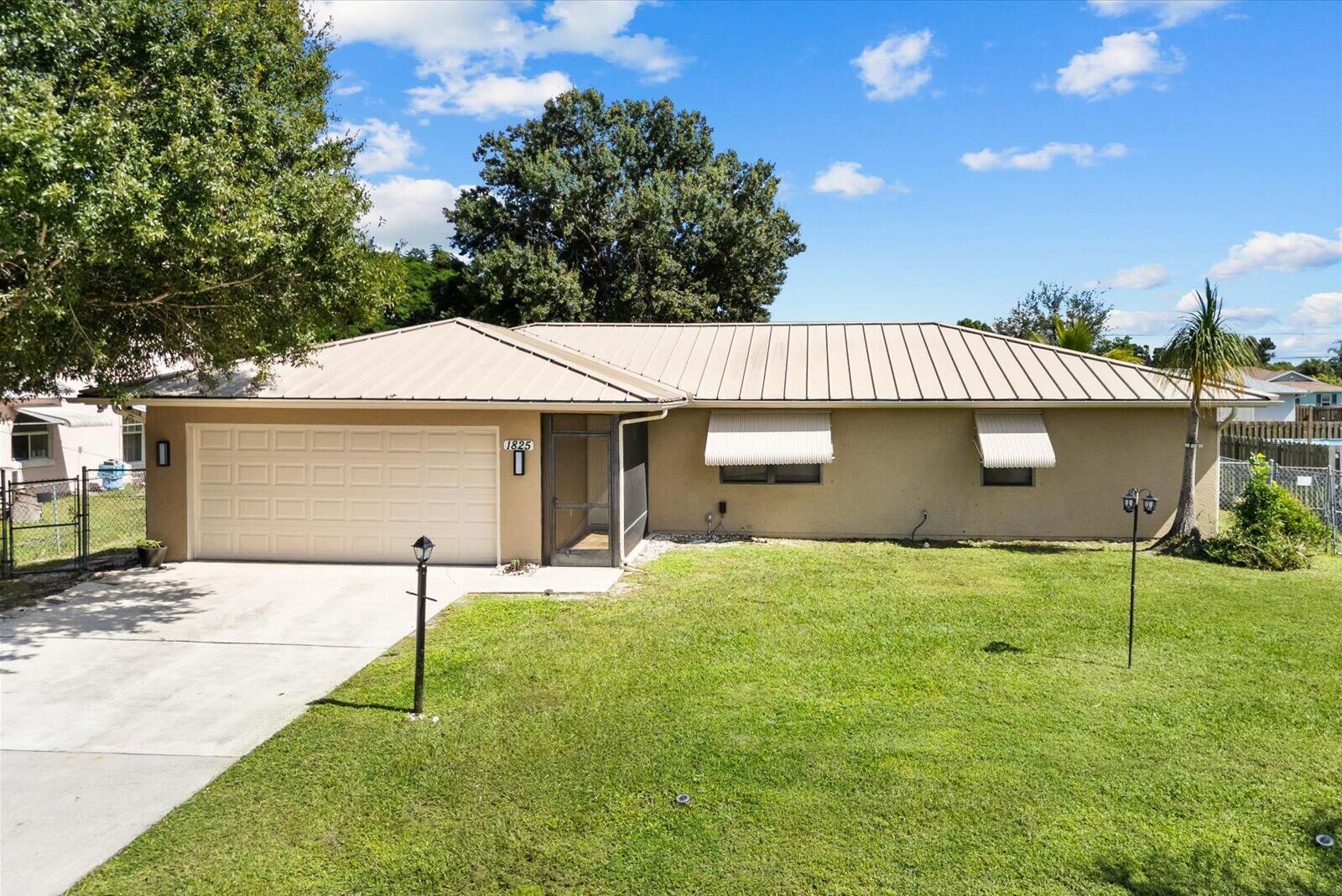 Property Photo: 1825 SW Cameo Boulevard FL 34953