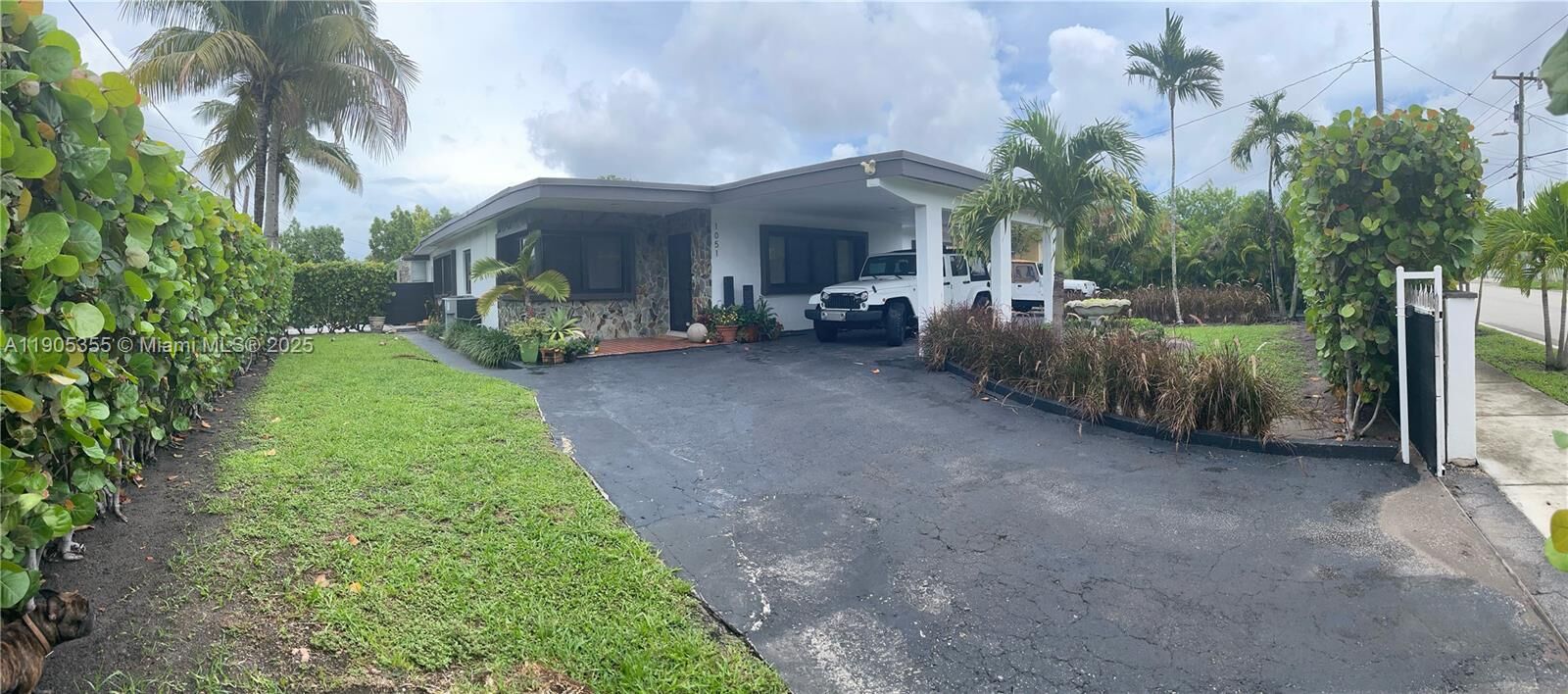 Property Photo:  1051 NW 25th Ave  FL 33125