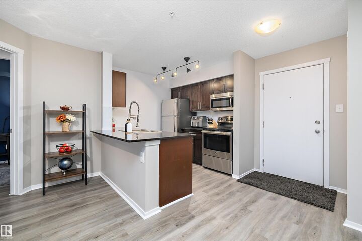 Property Photo: 18126 77 Street NW 116 AB T5Z 0N7